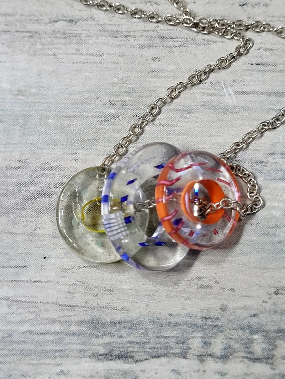 Silver Chain Necklace with Multicolor Three Glass Ring Pendants.